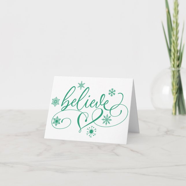 Believe Script | Green Christmas Snowflake Swirls Holiday Card (Front)