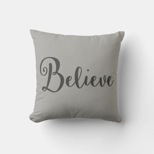 "Believe" Text in Dark Grey on Grey Pillow (Front)