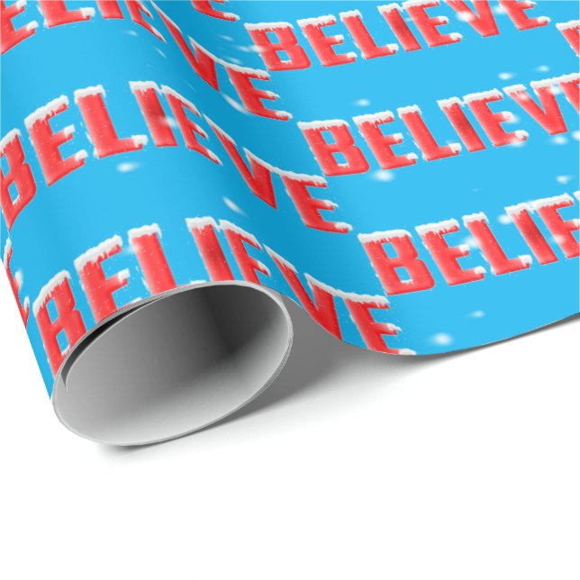 BELIEVE text with snowflakes on aqua Wrapping Paper (Roll Corner)