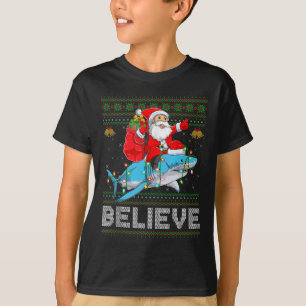 Believe Xmas Funny Santa Riding Shark Ugly Christm T-Shirt