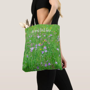 Bell-flower on a green meadow tote bag