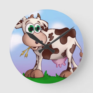 Bella The Cow Eating Hay on a Hill Top Round Clock