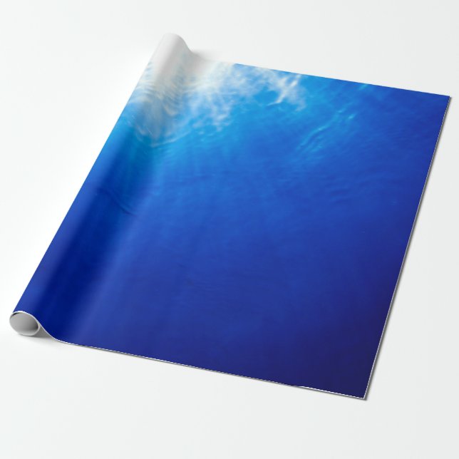 Below beneath blue deep dive wrapping paper (Unrolled)