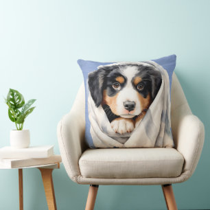 BERNESE MOUNTAIN DOG PUPPY UNDER BLANKET CUSHION