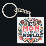 Best Mom In The World Folk Art Floral Mother's Day Key Ring<br><div class="desc">Show Mom she's the absolute best with this vibrant "Best Mom in the World" keychain. Featuring a stunning folk-art-inspired border of colorful blooms, teal leaves, and hidden hearts, this design frames a bold and loving message. This keychain is a beautiful daily reminder of how much she is appreciated. It makes...</div>