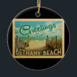 Bethany Beach Ornament Vintage Travel<br><div class="desc">This Greetings From Bethany Beach vintage postcard design features a sandy beach with a beautiful turquoise ocean water and above the sea,  a blue sky with billowy white clouds. In vintage travels style.</div>