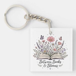 Between books and blooms book lover reader key ring