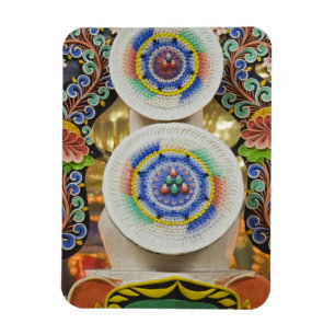 Bhutan. Ceremonial cakes made by monks adorn the Magnet