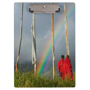Bhutan, Gangtey village, Rainbow over two monks Clipboard