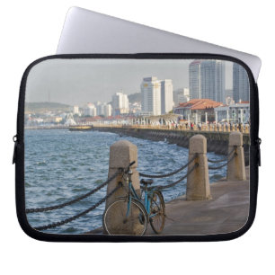 Bicycle at waterfront with Yantai city skyline, Laptop Sleeve