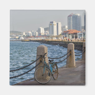 Bicycle at waterfront with Yantai city skyline, Magnet