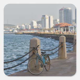 Bicycle at waterfront with Yantai city skyline, Square Sticker
