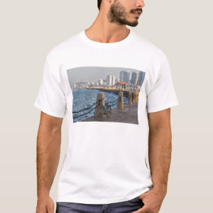 Bicycle at waterfront with Yantai city skyline, T-Shirt