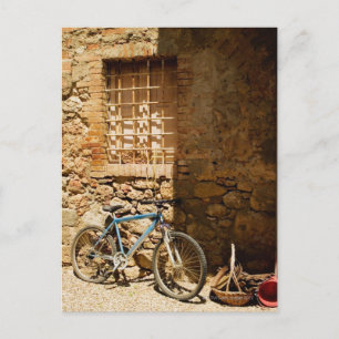 Bicycle in front of a wall, Monteriggioni, Siena Postcard