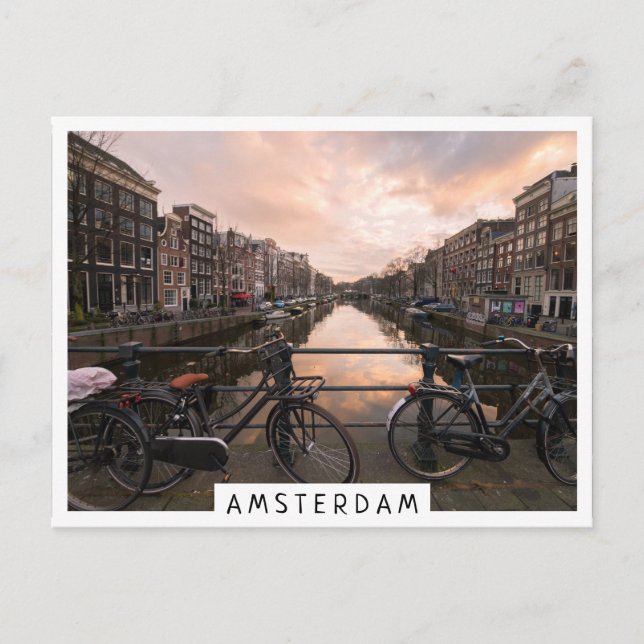 Bicycles at sunset in Amsterdam Postcard (Front)