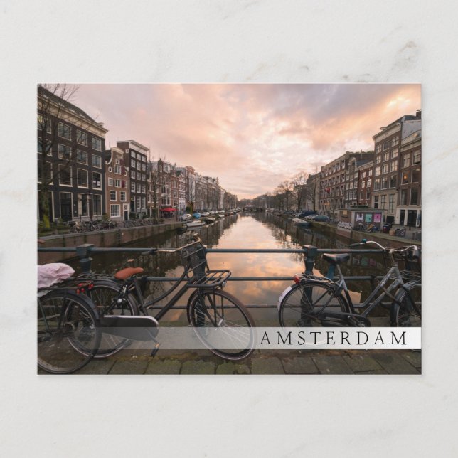 Bicycles at sunset in Amsterdam Postcard (Front)