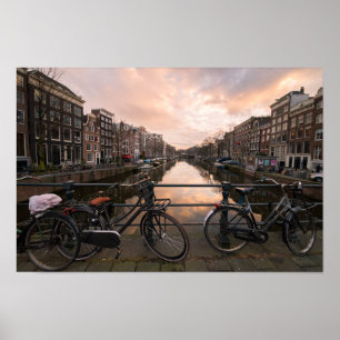 Bicycles at sunset in Amsterdam Poster