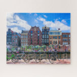 Bicycles Houses Along Amsterdam Canal Netherlands Jigsaw Puzzle<br><div class="desc">This stunning city themed jigsaw puzzle features bicycles along the canal in Amsterdam with buildings in the background. #amsterdam #netherlands #holland #canal #bicycle #bicycles #waterfront #canal #europe #european #travel #adventure #jigsaw #puzzle #jigsawpuzzle #gifts #fun #stockingstuffers #games</div>