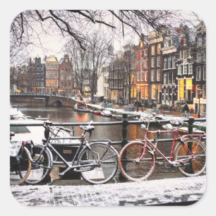 Bicycles in the snow in Amsterdam Square Sticker