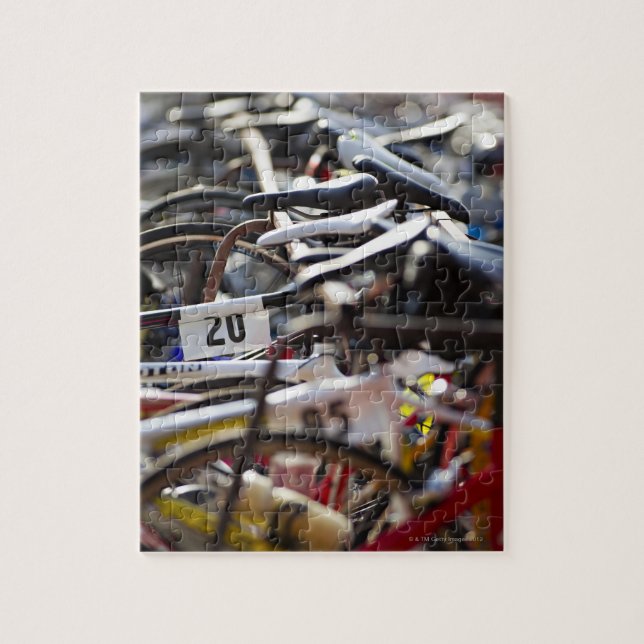 Bicycles on the rack at a triathlon race ready jigsaw puzzle (Vertical)