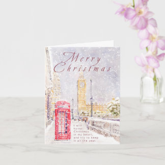 Big Ben and red telephone booth in snow Card