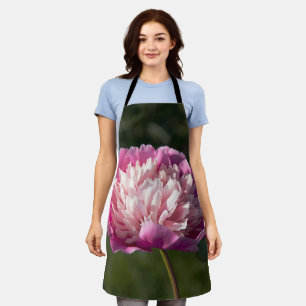 Big pink peony flowers in spring day apron