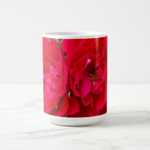 Big red roses in the garden    coffee mug