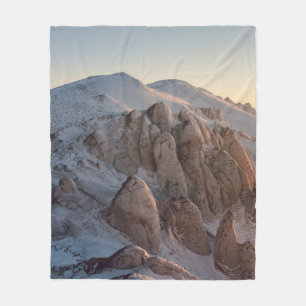 BIG ROCK FORMATIONS COVERED WITH SNOW FLEECE BLANKET