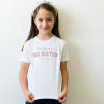 Big sister fun sporty personalised pink T-Shirt<br><div class="desc">Designed to coordinate with the Lea Delaveris Design tailgate baby shower collection, this sporty big sister shirt is a perfect gift for a new sibling. It's great for announcing a new baby or for when the little sibling is born. This sporty t-shirt design features a "team name" in white script...</div>