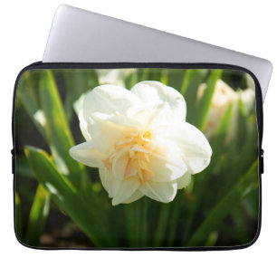 Big white daffodils on a spring day laptop sleeve