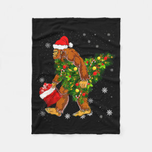 Bigfoot Carrying Christmas Tree Sasquatch Believer Fleece Blanket