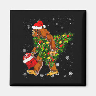 Bigfoot Carrying Christmas Tree Sasquatch Believer Magnet