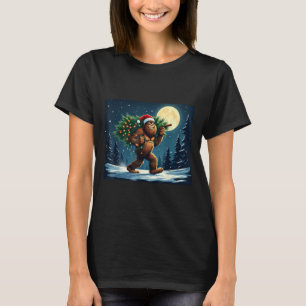 Bigfoot Carrying Christmas Tree Sasquatch Holiday T-Shirt