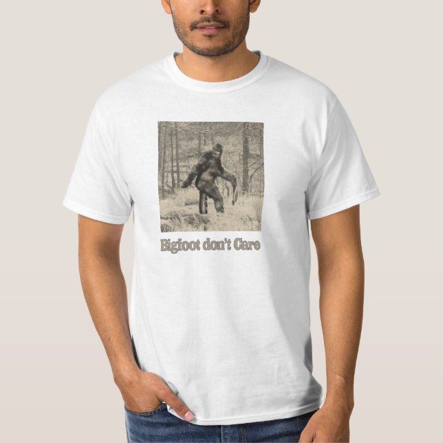 Bigfoot don't care - carrying a honey badger T-Shirt (Front)