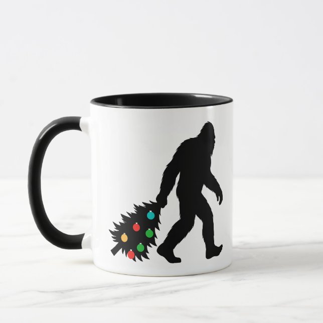 Bigfoot Dragging Christmas Tree Mug (Left)