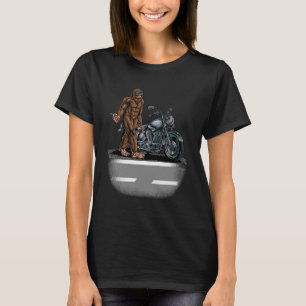 Bigfoot Riding A Motorcycle Bike Trying To Hitch A T-Shirt