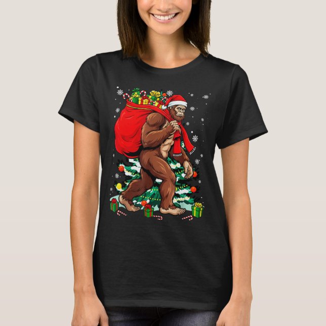 Bigfoot Santa Carrying Christmas Bag Xmas Hat Sasq T-Shirt (Front)