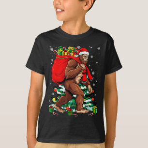 Bigfoot Santa Carrying Christmas Bag Xmas Hat Sasq T-Shirt