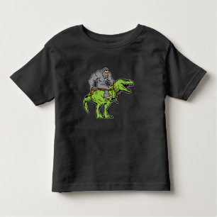 Bigfoot Sasquatch Riding Dinosaur T rex Toddler T-Shirt