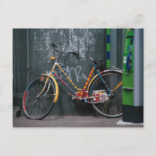 Bike Resting On Graffitti Wall Postcard