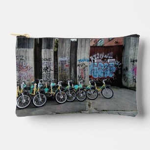 Bikes , in front of graffiti wall accessory pouch