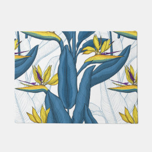 Bird of paradise flowers on white doormat