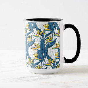 Bird of paradise flowers on white mug