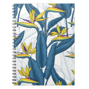 Bird of paradise flowers on white notebook
