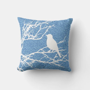 Bird on a Branch, White Against Sky  Blue Cushion