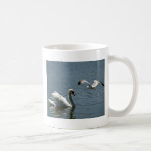 Bird Playing With Swan Coffee Mug