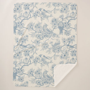 Birds and cherry blossom in blue and off white sherpa blanket