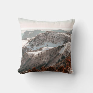 BIRD'S-EYE VIEW OF SNOW COVERED MOUNTAIN UNDER CLE CUSHION