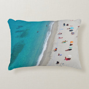 Bird's eye view photo of people on beach decorative cushion