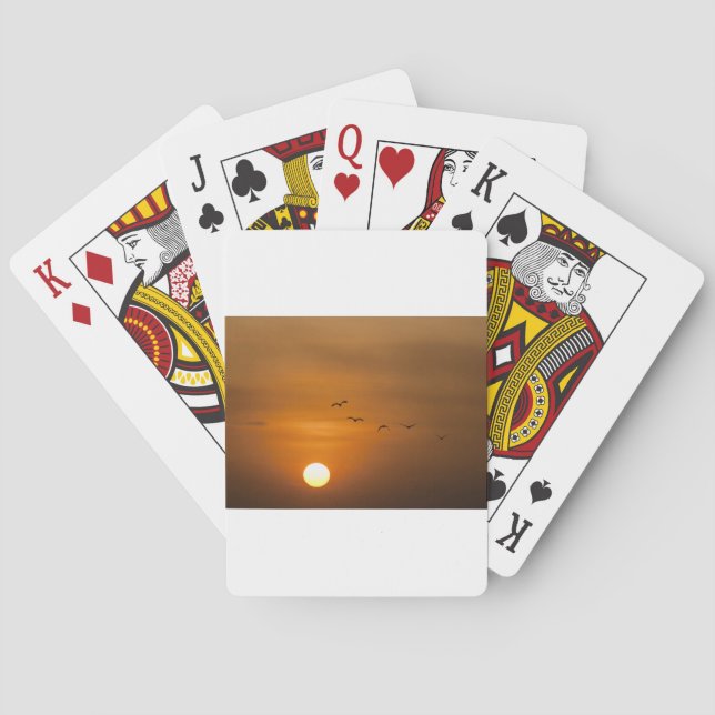Birds flying in sunset playing cards (Back)